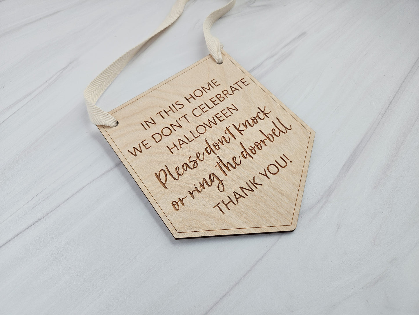 Engraved Wood Door Sign - In This House We Don't Celebrate Halloween